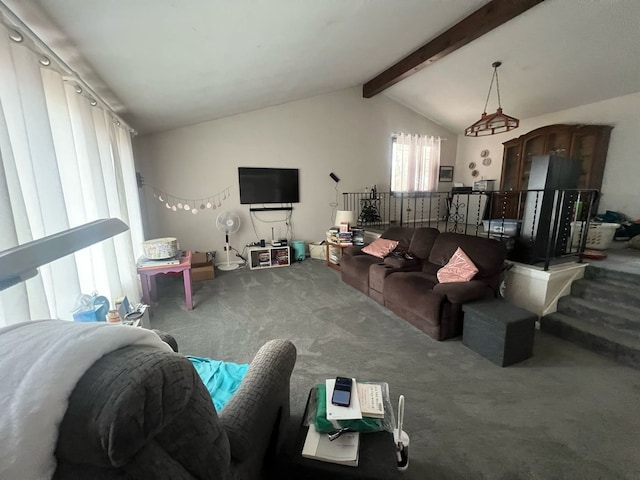 living area featuring vaulted ceiling with beams and carpet flooring