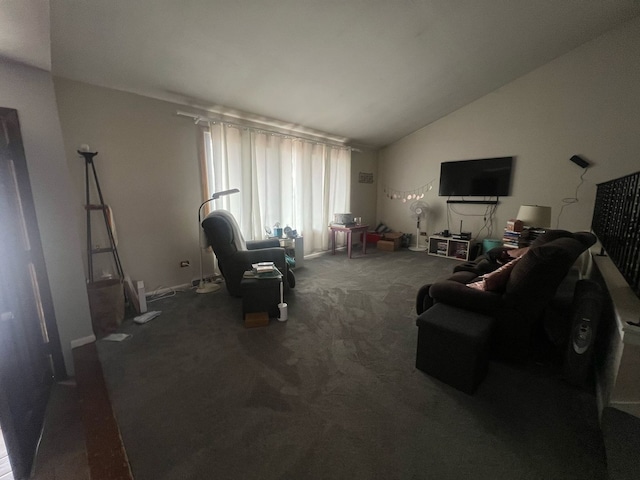 carpeted living room with lofted ceiling