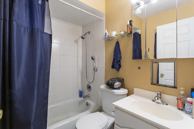 bathroom featuring vanity, toilet, and shower / tub combo