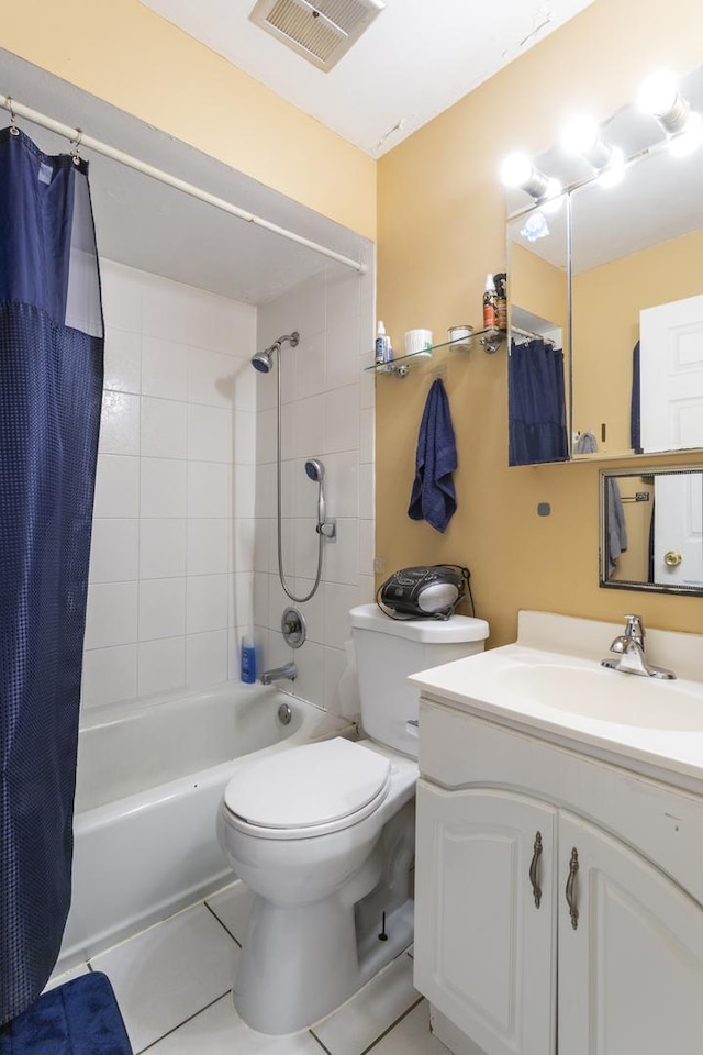 bathroom featuring visible vents, toilet, shower / bath combo, tile patterned floors, and vanity