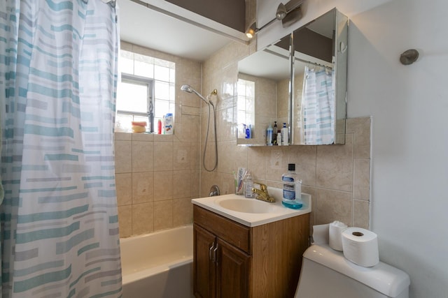 bathroom with tile walls, toilet, shower / tub combo with curtain, decorative backsplash, and vanity