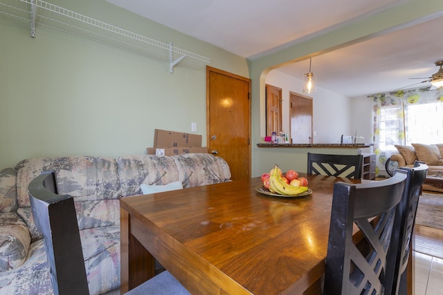 dining area featuring a ceiling fan