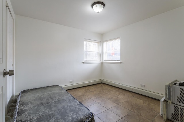 empty room with a baseboard heating unit