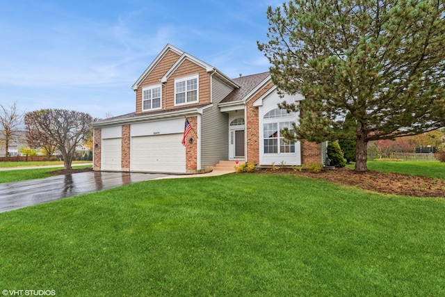 traditional-style home featuring a front lawn, a garage, brick siding, and driveway