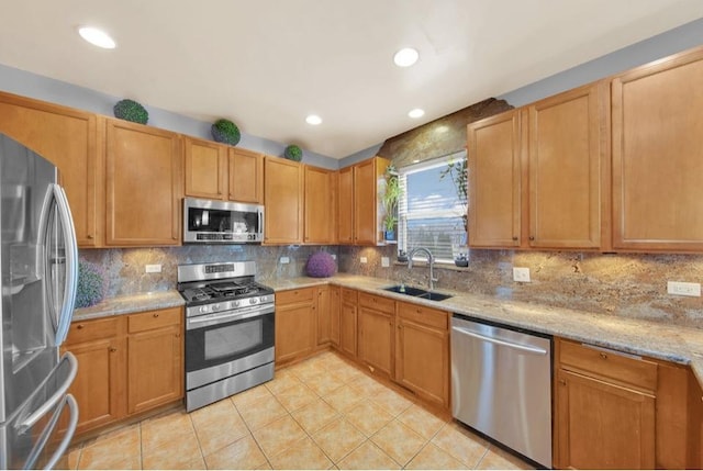 26800 Basswood Cir, Plainfield, IL 60585 - kitchen featuring a sink, stainless steel appliances, backsplash, and light tile patterned floors