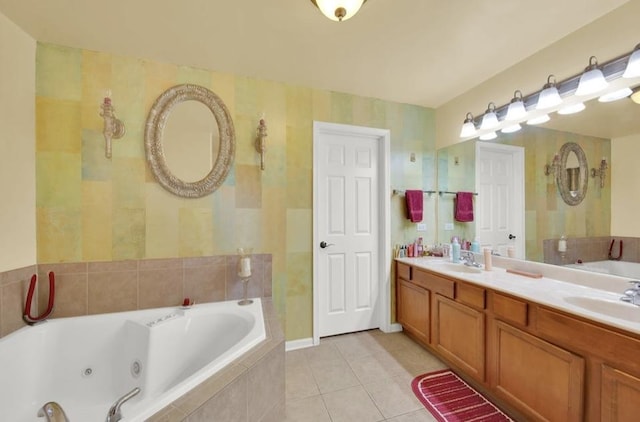 26800 Basswood Cir, Plainfield, IL 60585 - bathroom featuring tile patterned flooring, double vanity, a jetted tub, and a sink