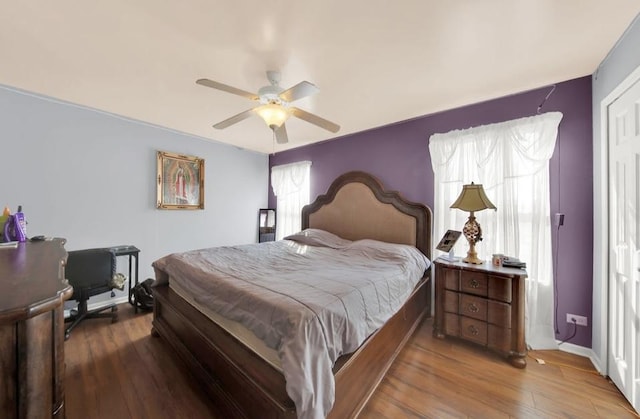 26800 Basswood Cir, Plainfield, IL 60585 - bedroom featuring baseboards, wood finished floors, and a ceiling fan