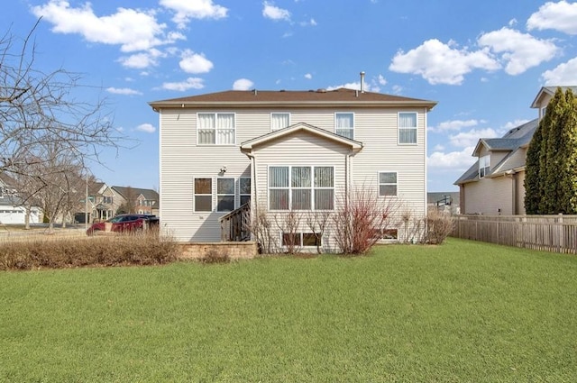 26800 Basswood Cir, Plainfield, IL 60585 - back of property with a yard and fence
