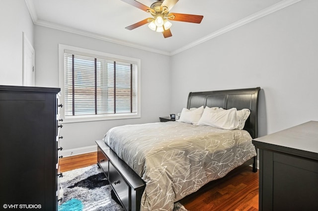 bedroom with ceiling fan, baseboards, ornamental molding, and dark wood-style flooring