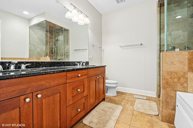 full bath featuring visible vents, double vanity, a sink, tile patterned flooring, and a shower stall