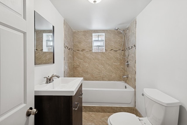 full bathroom featuring shower / washtub combination, toilet, and vanity