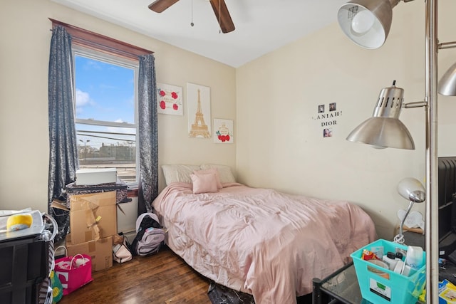 bedroom with dark wood finished floors and ceiling fan