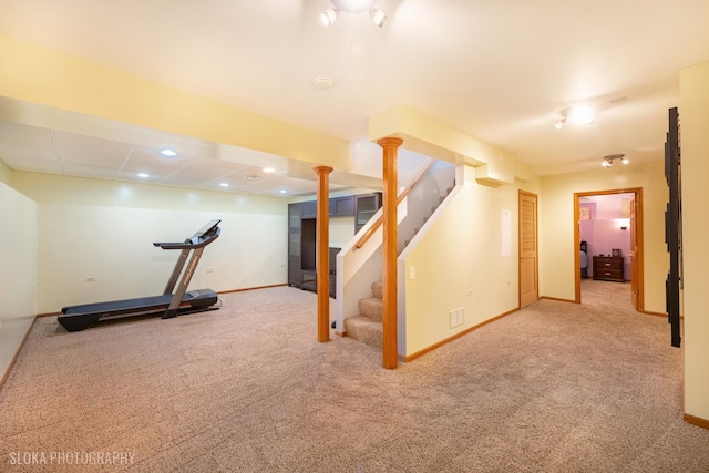 exercise area with recessed lighting, visible vents, baseboards, and carpet