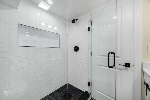 full bathroom featuring a shower stall