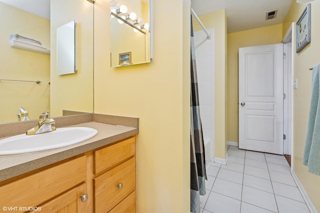 bathroom featuring tile patterned floors, visible vents, vanity, and shower / bath combination with curtain