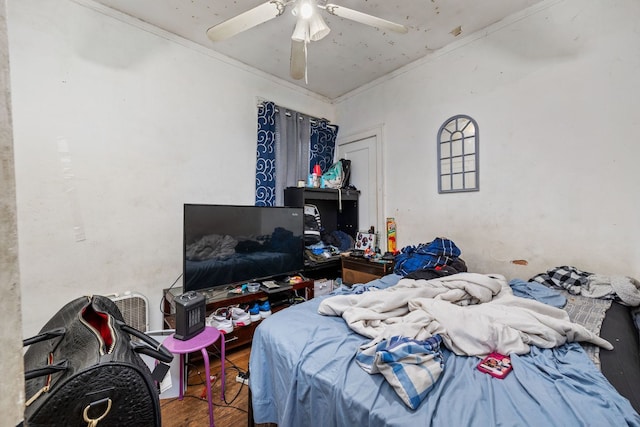 bedroom featuring ceiling fan and wood finished floors