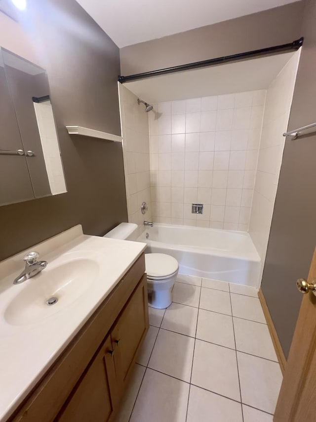 full bathroom with toilet, tile patterned flooring, shower / tub combination, and vanity