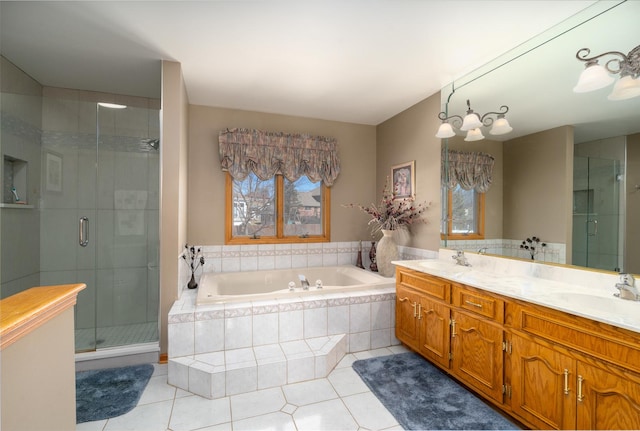 bathroom featuring a shower stall, tile patterned floors, and a sink