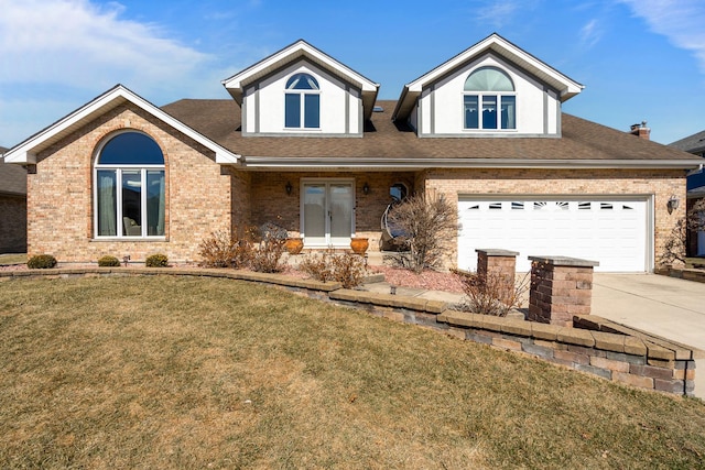 view of front of home with french doors, brick siding, concrete driveway, and a front lawn