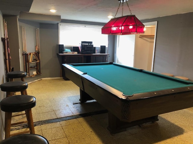 game room with tile patterned floors