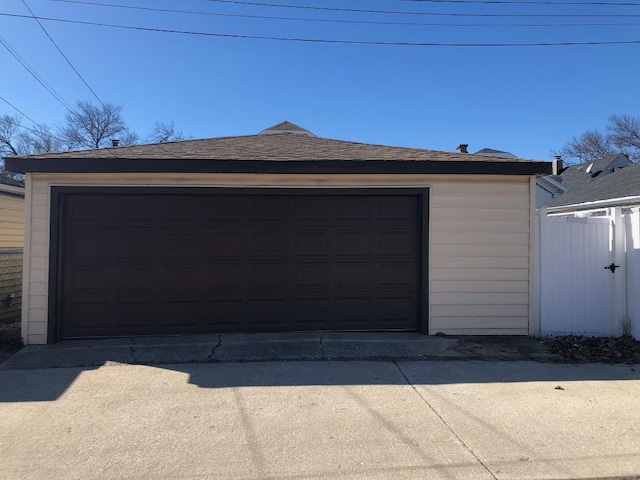 detached garage with fence