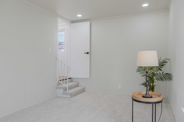 sitting room featuring carpet, stairway, and recessed lighting