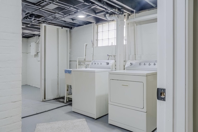 laundry room with laundry area and separate washer and dryer