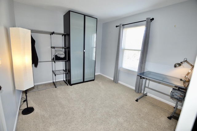 office featuring carpet floors and baseboards