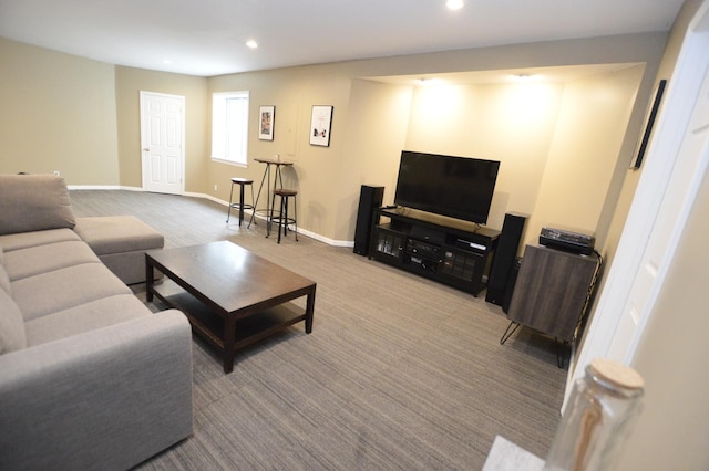 living area with carpet floors, recessed lighting, and baseboards