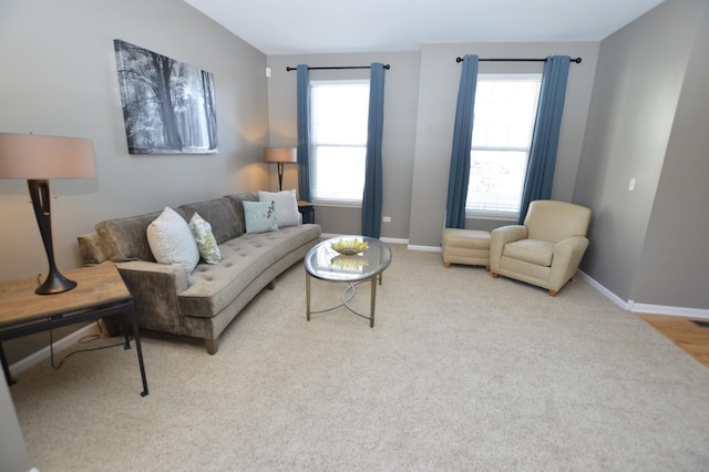 living room featuring baseboards