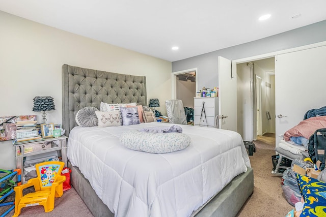 carpeted bedroom featuring recessed lighting