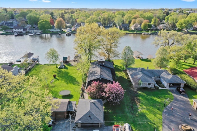 aerial view of residential area with a large body of water