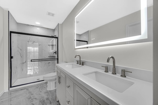 full bath with marble finish floor, a sink, and a marble finish shower