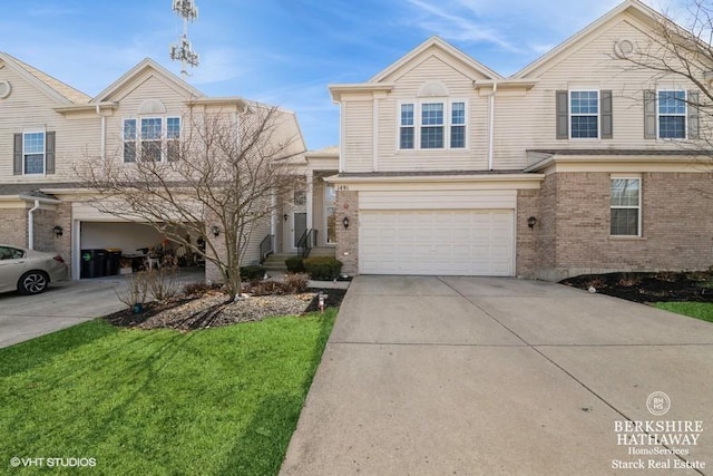 view of front facade with concrete driveway, brick siding, and a garage