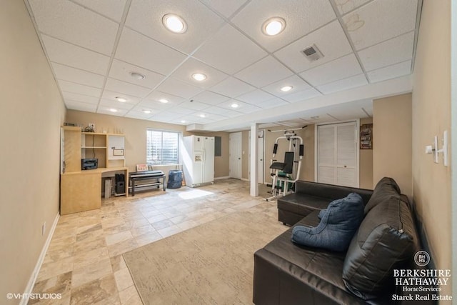 living area featuring visible vents, recessed lighting, a paneled ceiling, and baseboards