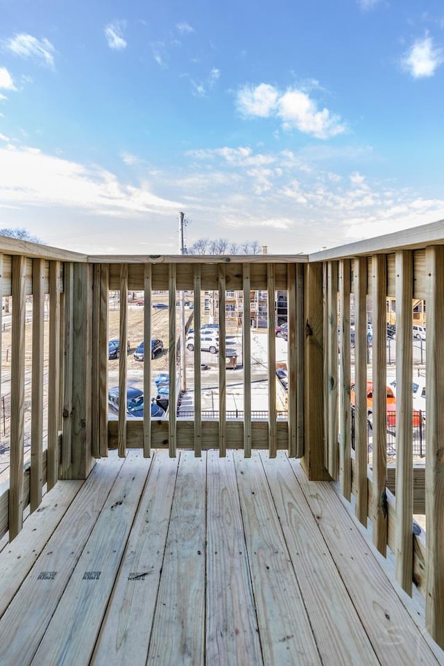 wooden terrace featuring a dock