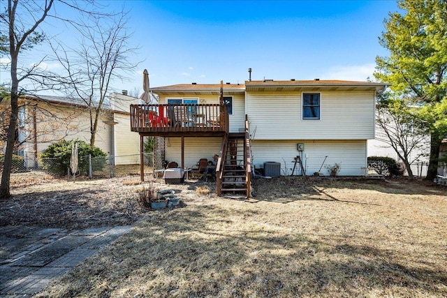 back of house with a fenced backyard, central AC, a deck, and stairs