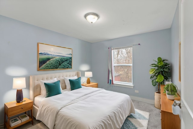 bedroom featuring baseboards