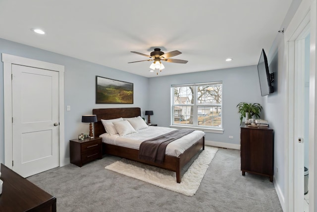 bedroom featuring carpet floors, recessed lighting, baseboards, and a ceiling fan