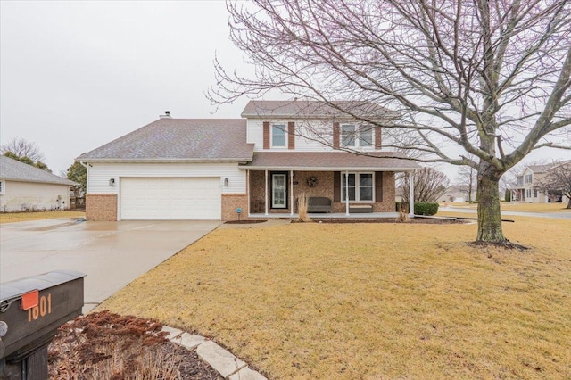 traditional-style house with driveway, an attached garage, covered porch, a front lawn, and brick siding