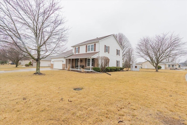 view of front of home featuring brick siding, a front lawn, a porch, concrete driveway, and a garage