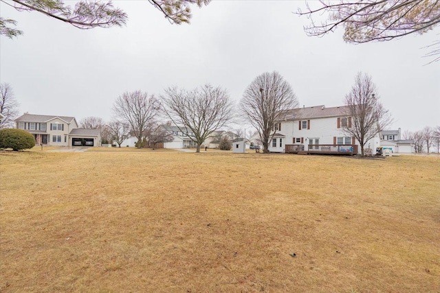 view of yard featuring a wooden deck