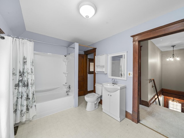 bathroom with toilet, shower / tub combo with curtain, tile patterned floors, vanity, and a notable chandelier