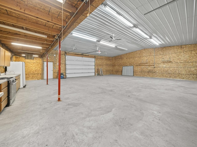 garage with freestanding refrigerator