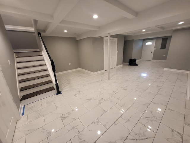 finished basement with marble finish floor, stairway, recessed lighting, and baseboards