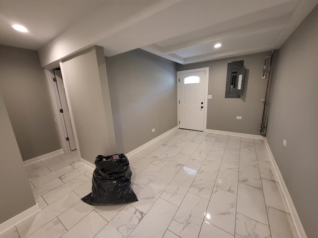 entrance foyer featuring recessed lighting, marble finish floor, electric panel, and baseboards