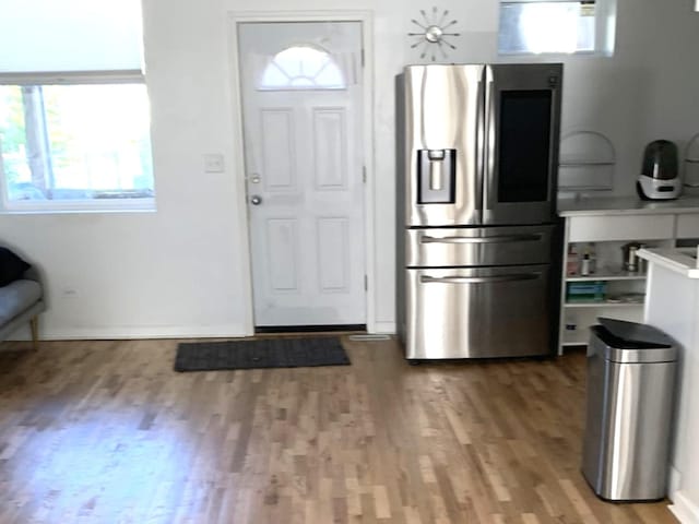 foyer with light wood-style flooring