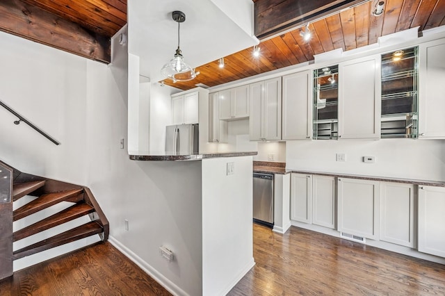 kitchen with dark wood-style floors, wood ceiling, baseboards, and appliances with stainless steel finishes