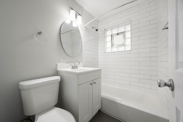 bathroom with vanity, toilet, and bathing tub / shower combination