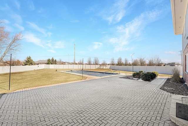 view of property's community featuring a patio area, a yard, and a fenced backyard